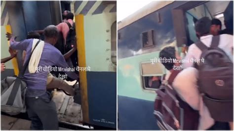 Video: People attempt to board train by jumping onto coupler